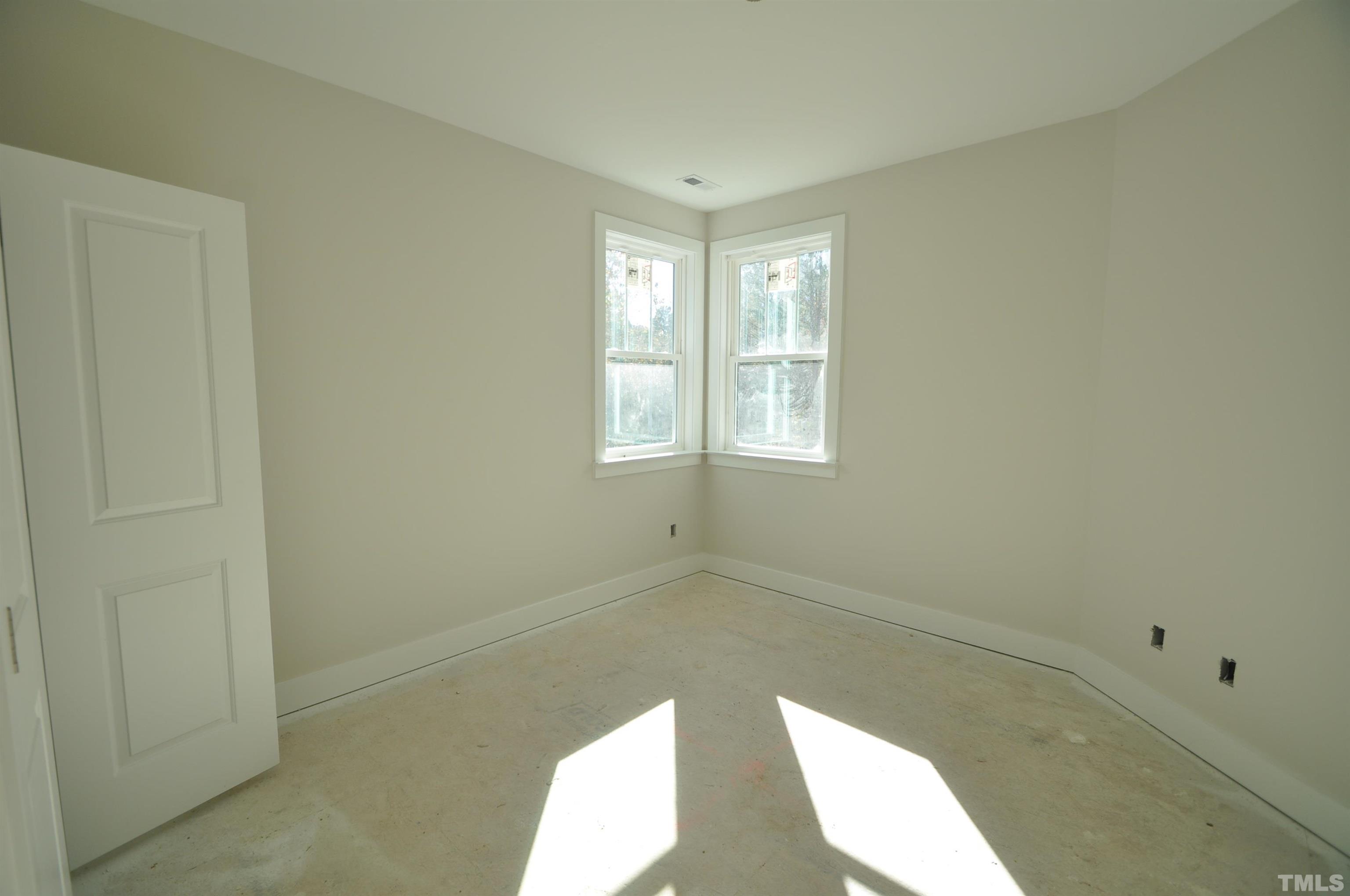 20 Pilot Ridge Road Zebulon, NC 27597 - Photo 7 of 14 a view of an empty room with a window