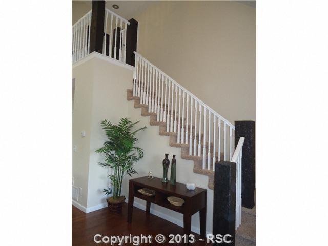 4027 N Road Divide, CO 80814 - Photo 4 of 20 Beautiful refinished railroad ties on stairwell