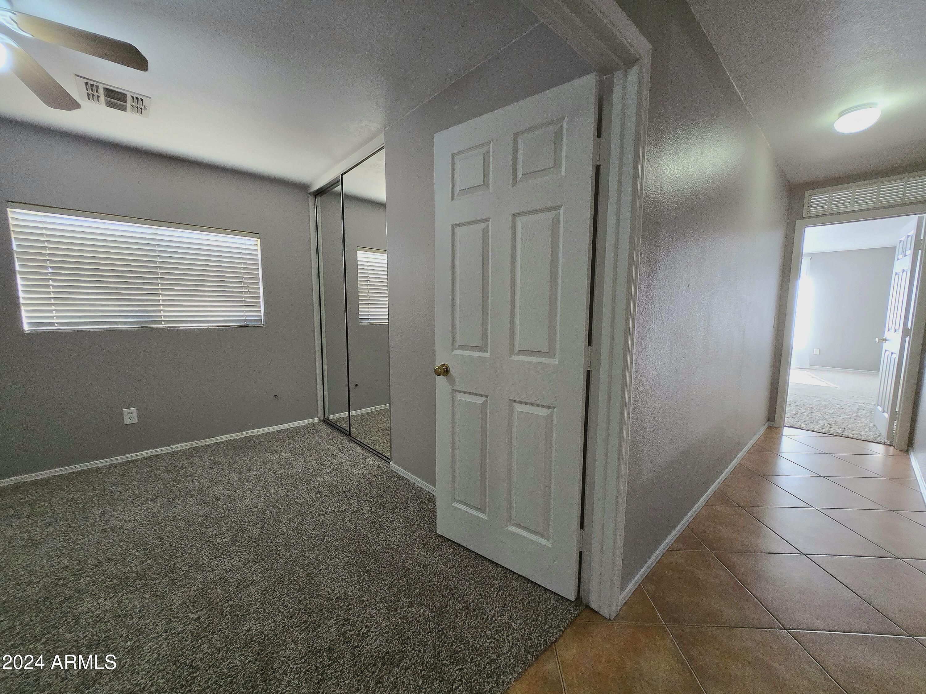 9365 West Eaton Road Phoenix, AZ 85037 - Photo 12 of 30 a view of a hallway