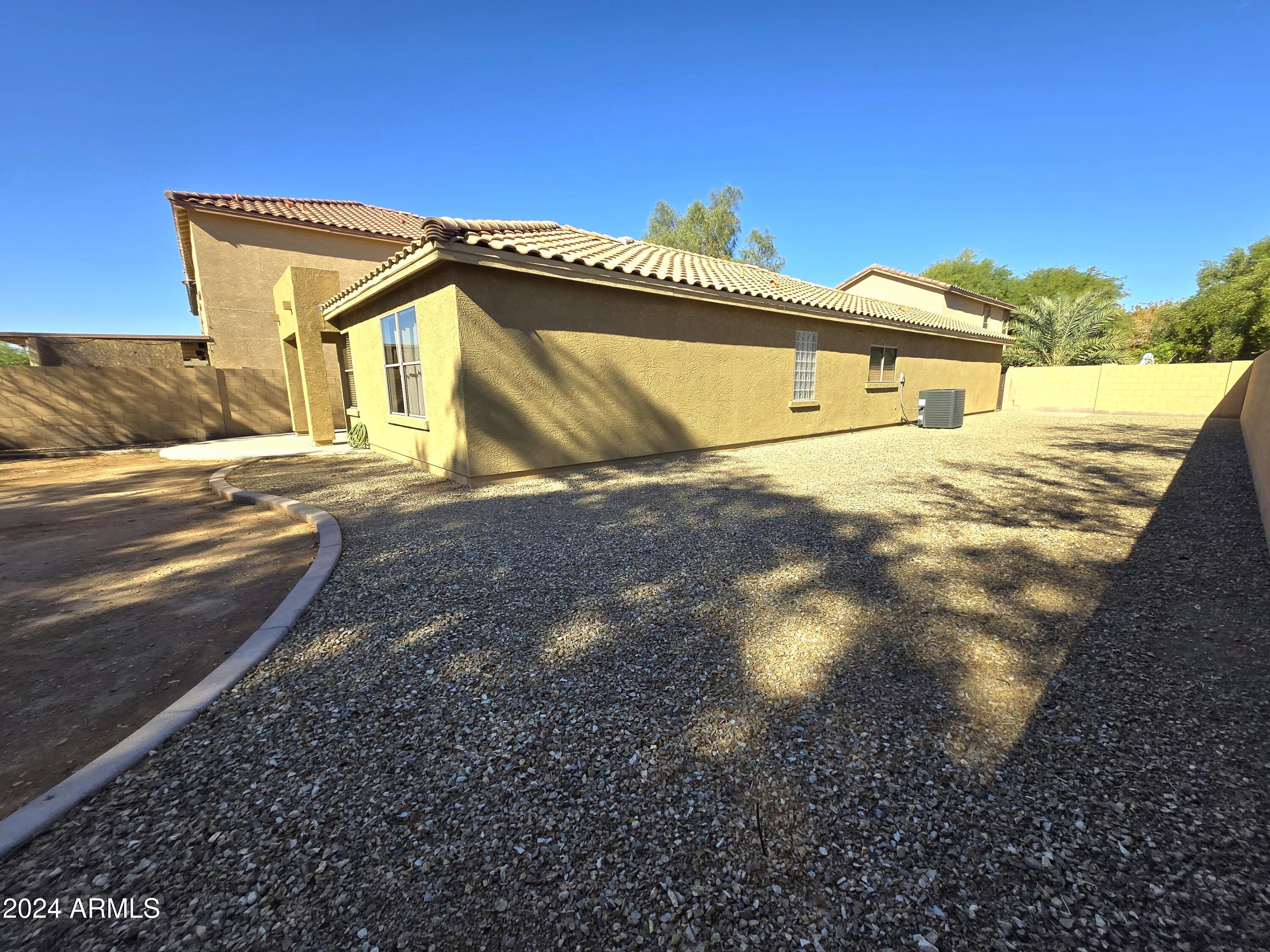 9365 West Eaton Road Phoenix, AZ 85037 - Photo 23 of 30 a view of a house with a snow
