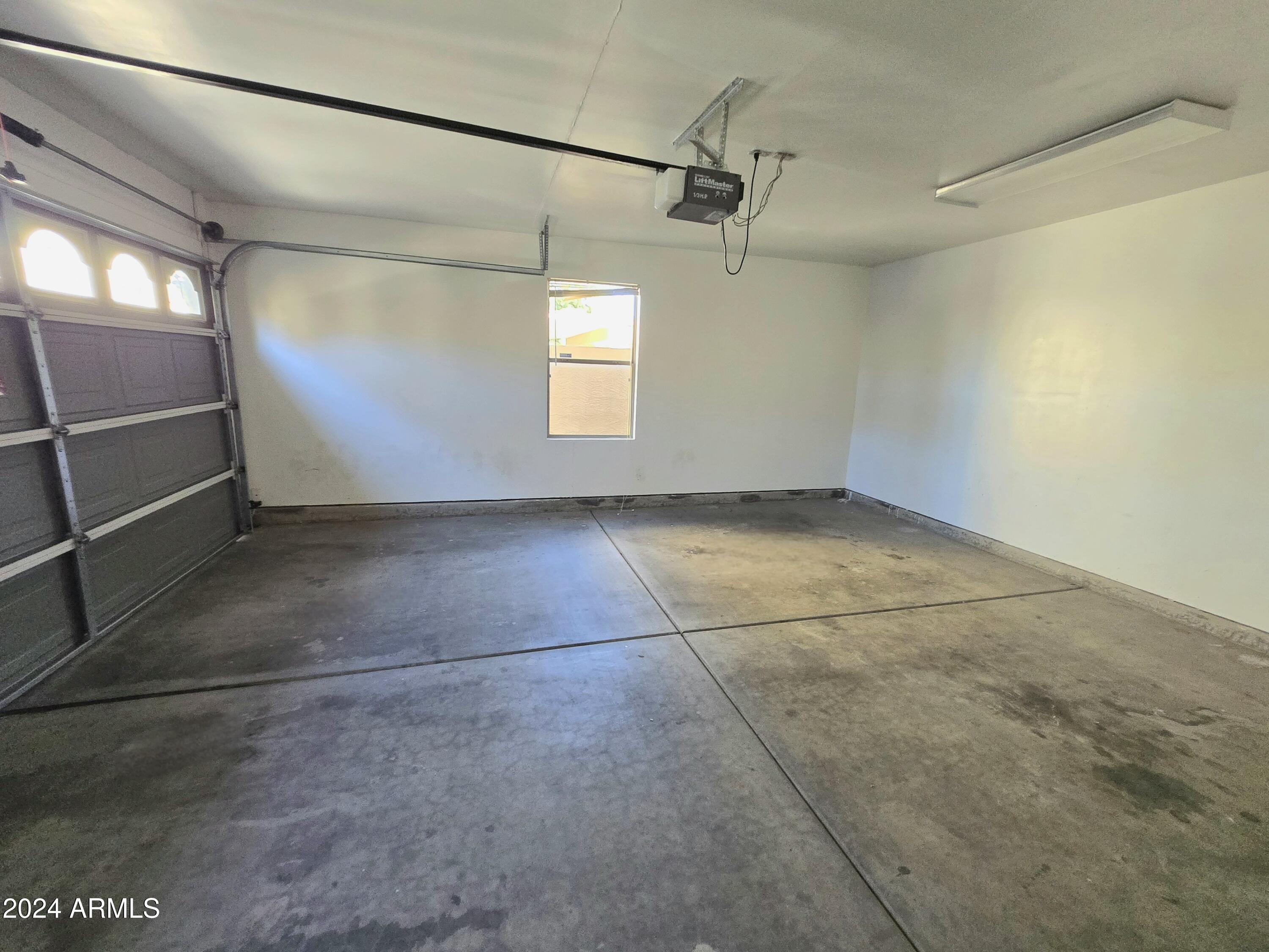 9365 West Eaton Road Phoenix, AZ 85037 - Photo 25 of 30 a view of an empty room with a window