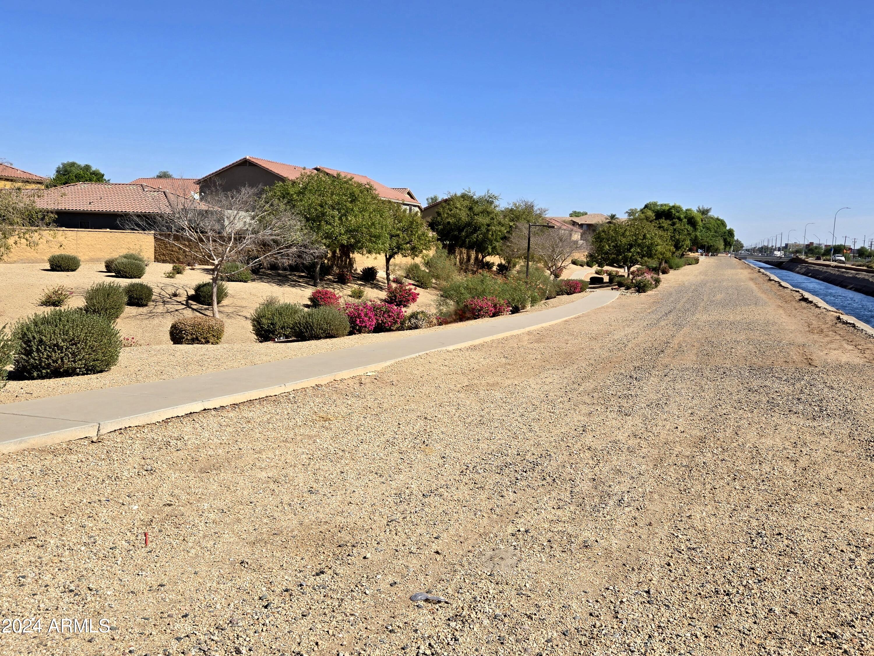 9365 West Eaton Road Phoenix, AZ 85037 - Photo 29 of 30 a view of a road with an ocean view