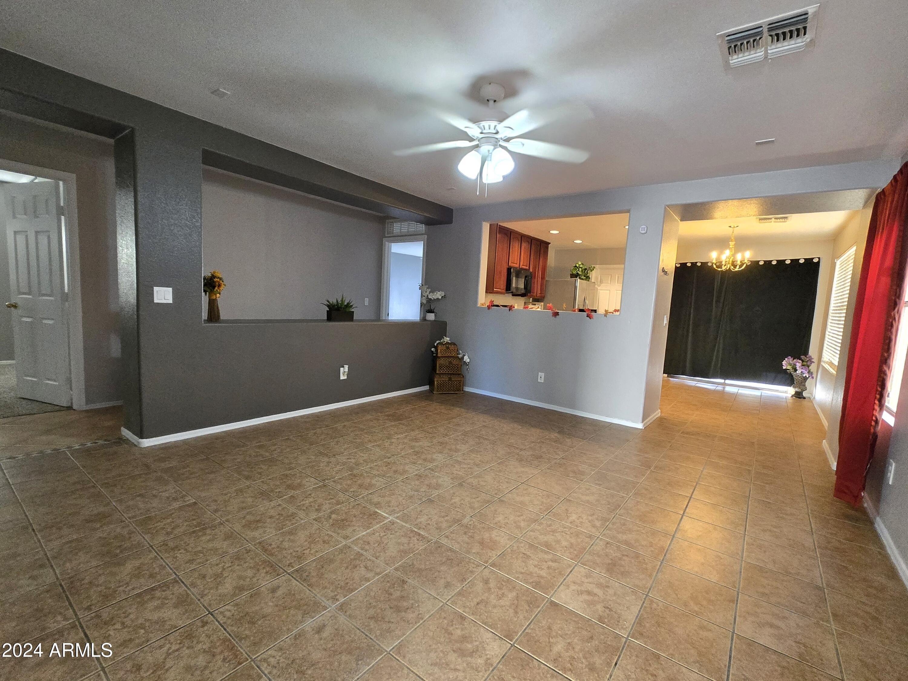 9365 West Eaton Road Phoenix, AZ 85037 - Photo 8 of 30 a view of livingroom with hardwood floor