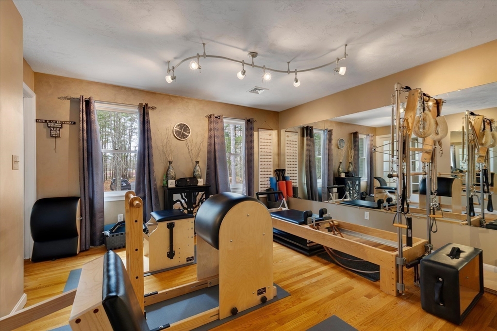 116 Meadow Street Carver, MA 02330 - Photo 18 of 42 a view of a room with gym equipment