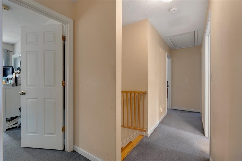 116 Meadow Street Carver, MA 02330 - Photo 21 of 42 a view of a hallway with closet area