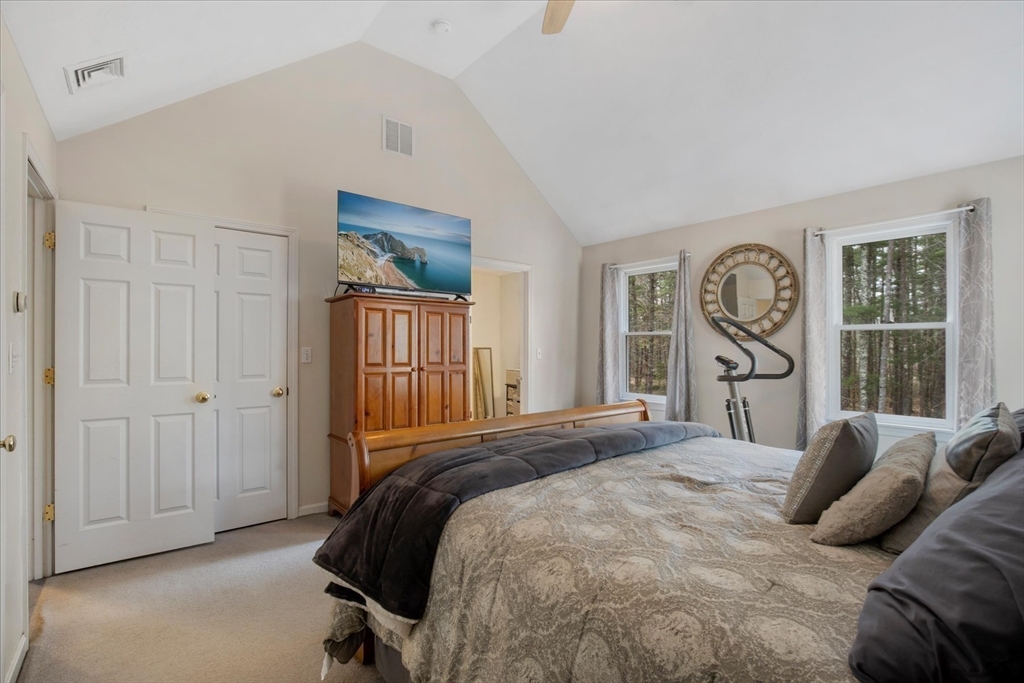 116 Meadow Street Carver, MA 02330 - Photo 30 of 42 a bedroom with a bed and a window