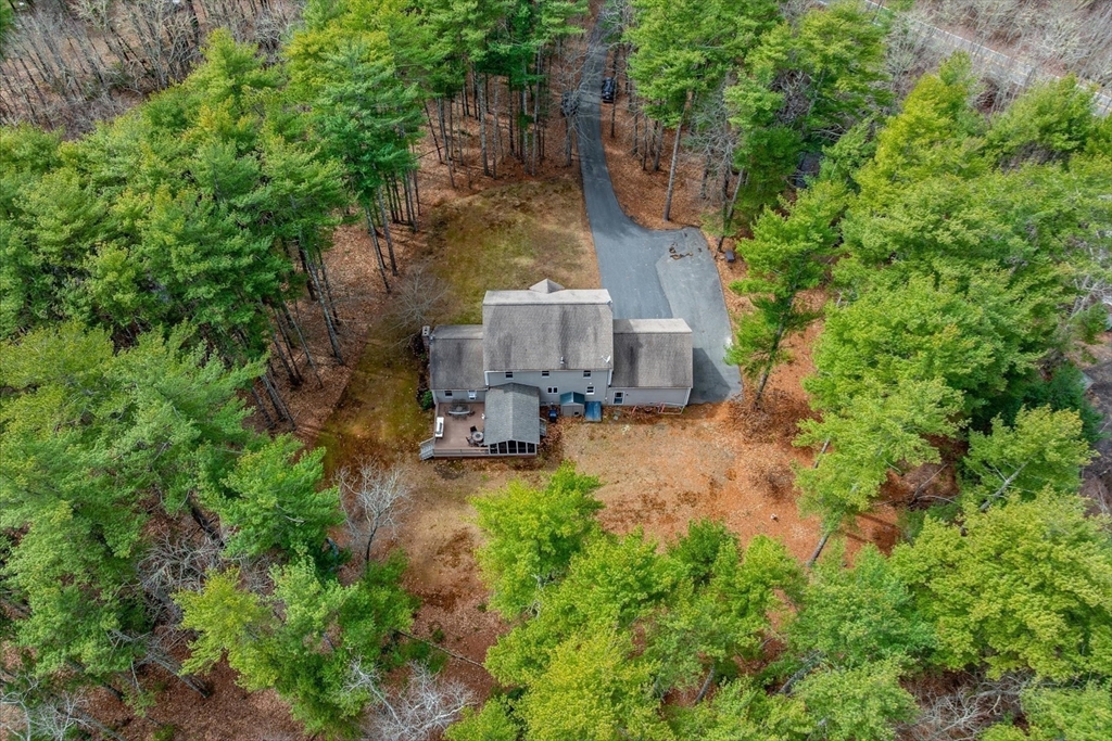 116 Meadow Street Carver, MA 02330 - Photo 41 of 42 an aerial view of a house with a yard