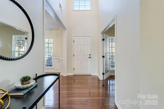 a view of a livingroom with furniture and windows