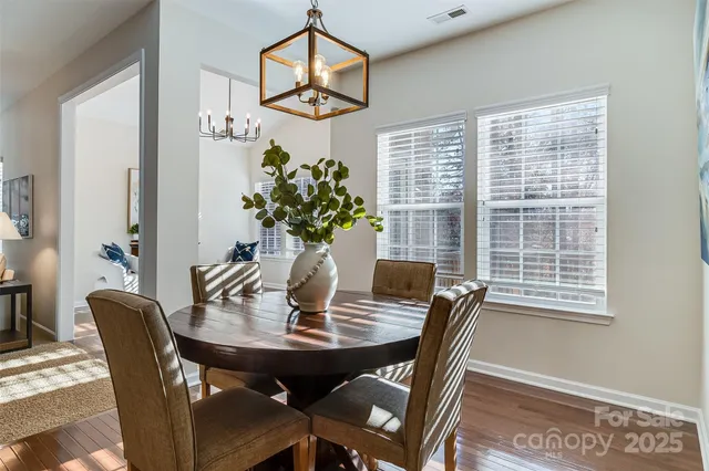 a view of a dining room with furniture window and outside view