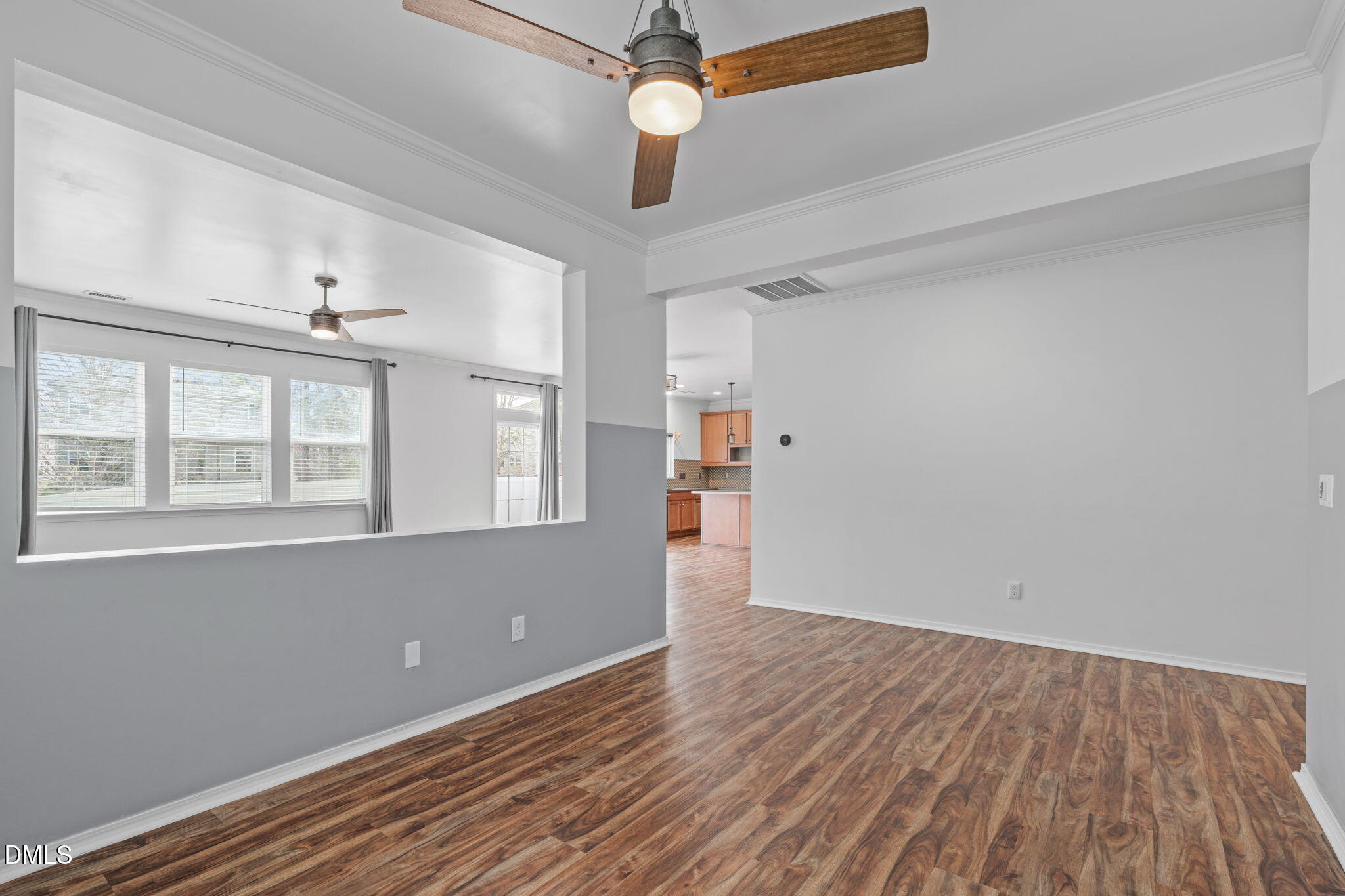 124 Daneborg Road Durham, NC 27703 - Photo 19 of 40 wooden floor in an empty room with a window