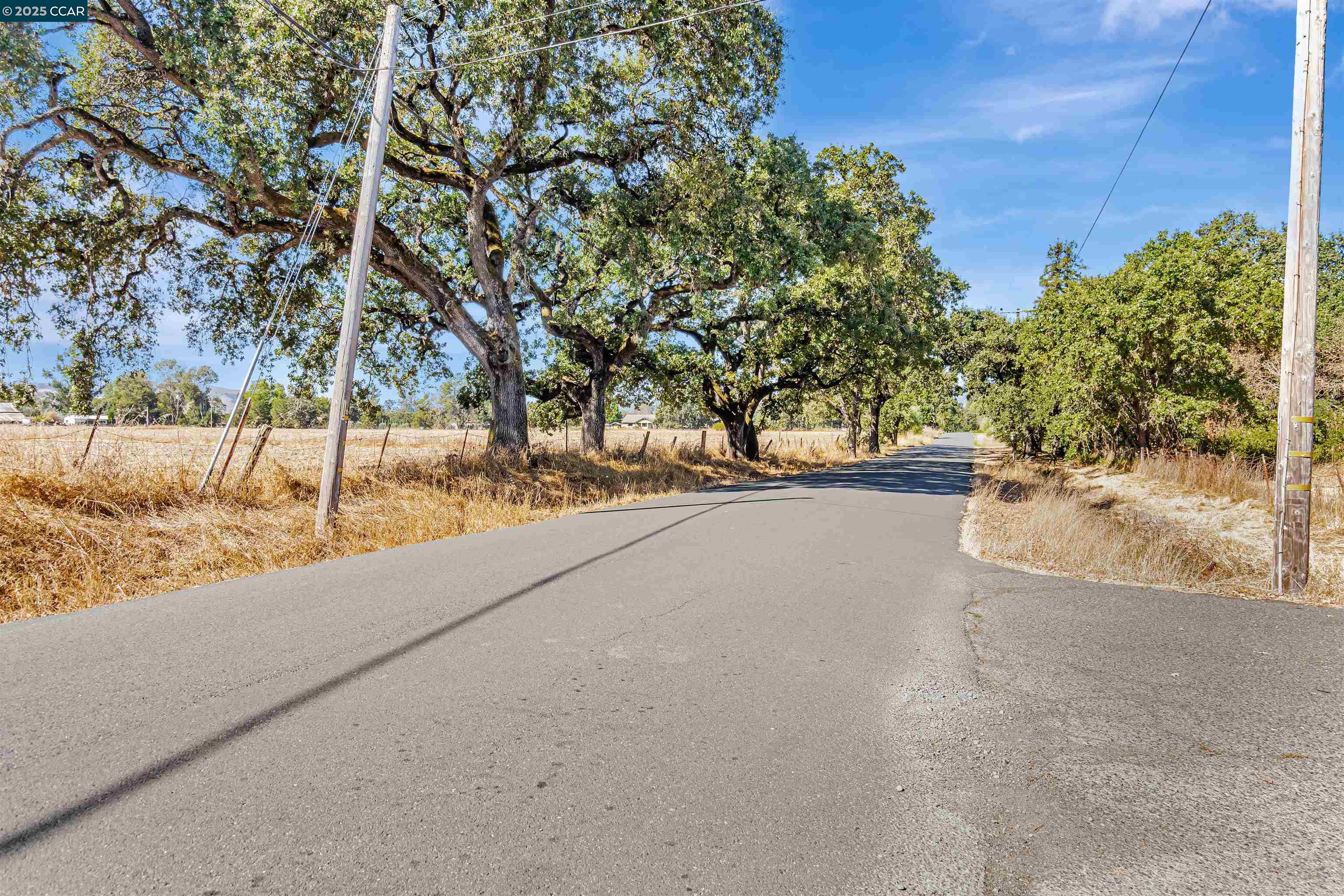 21200 Silva Road Sonoma, CA 95476 - Photo 21 of 41 a view of a road with a yard
