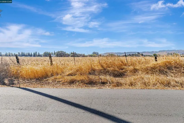 a view of an ocean and a mountain