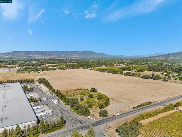 a view of a city with an ocean view