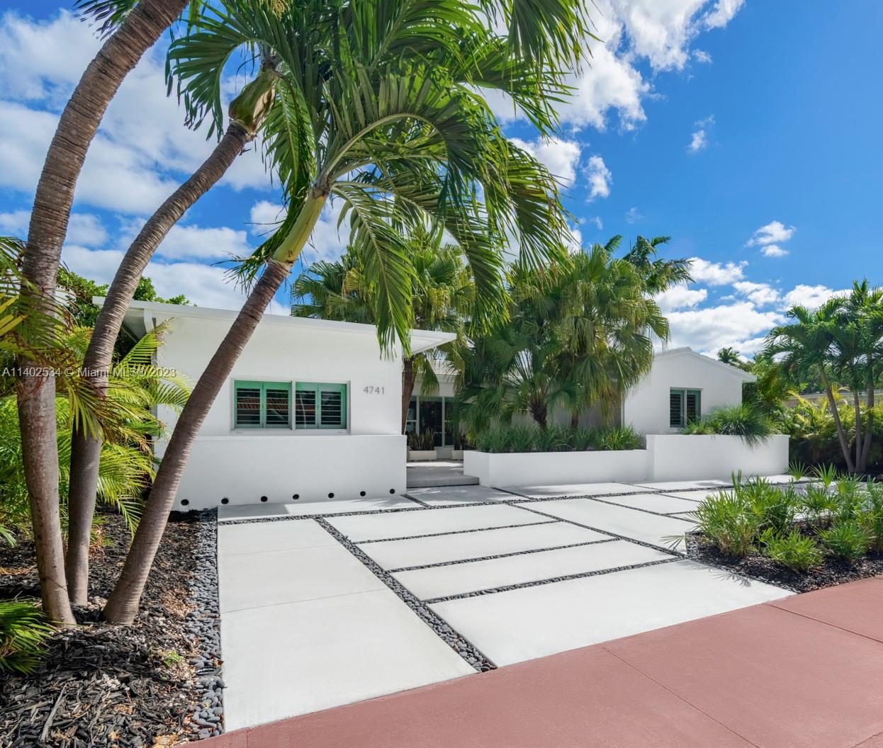 4741 Alton Road Miami Beach, FL 33140 - Photo 1 of 27 a view of a house with a tree