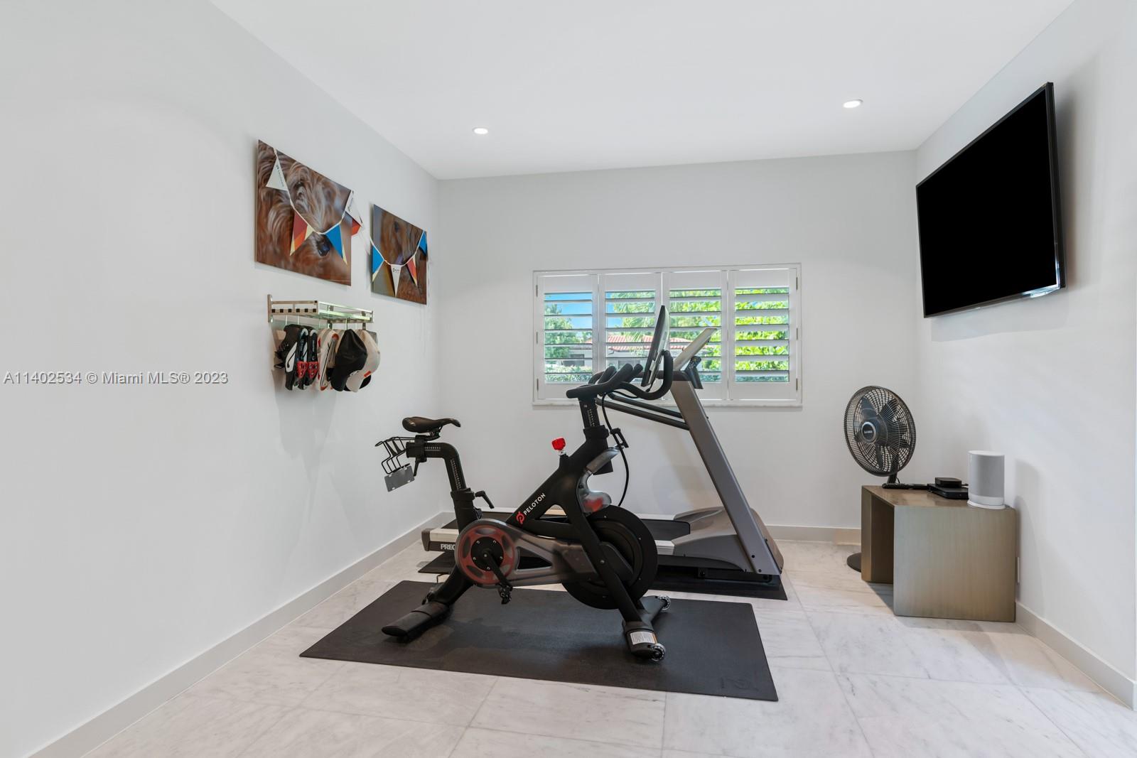 4741 Alton Road Miami Beach, FL 33140 - Photo 14 of 27 a view of a room with gym equipment