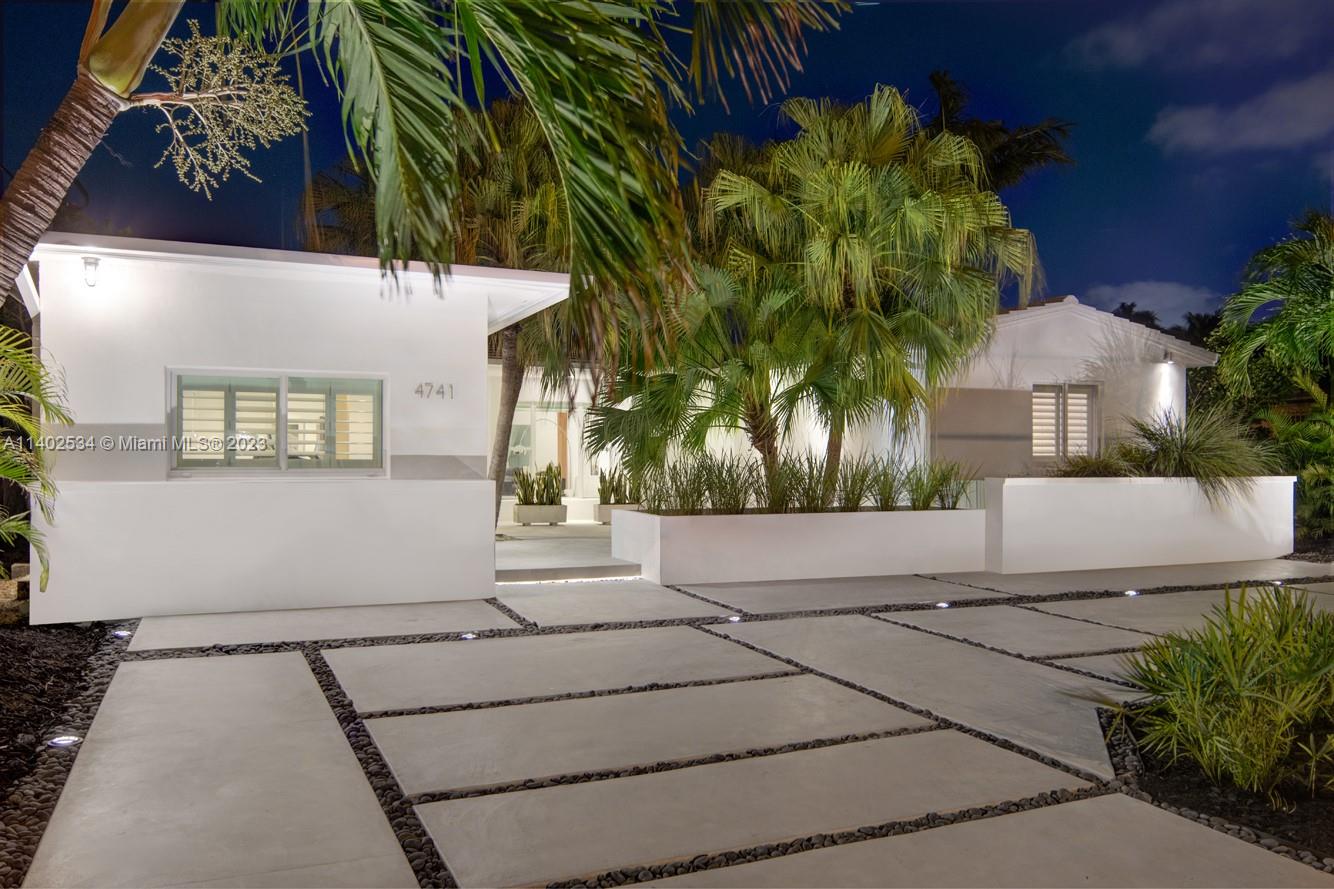 4741 Alton Road Miami Beach, FL 33140 - Photo 24 of 27 a house view with a outdoor space
