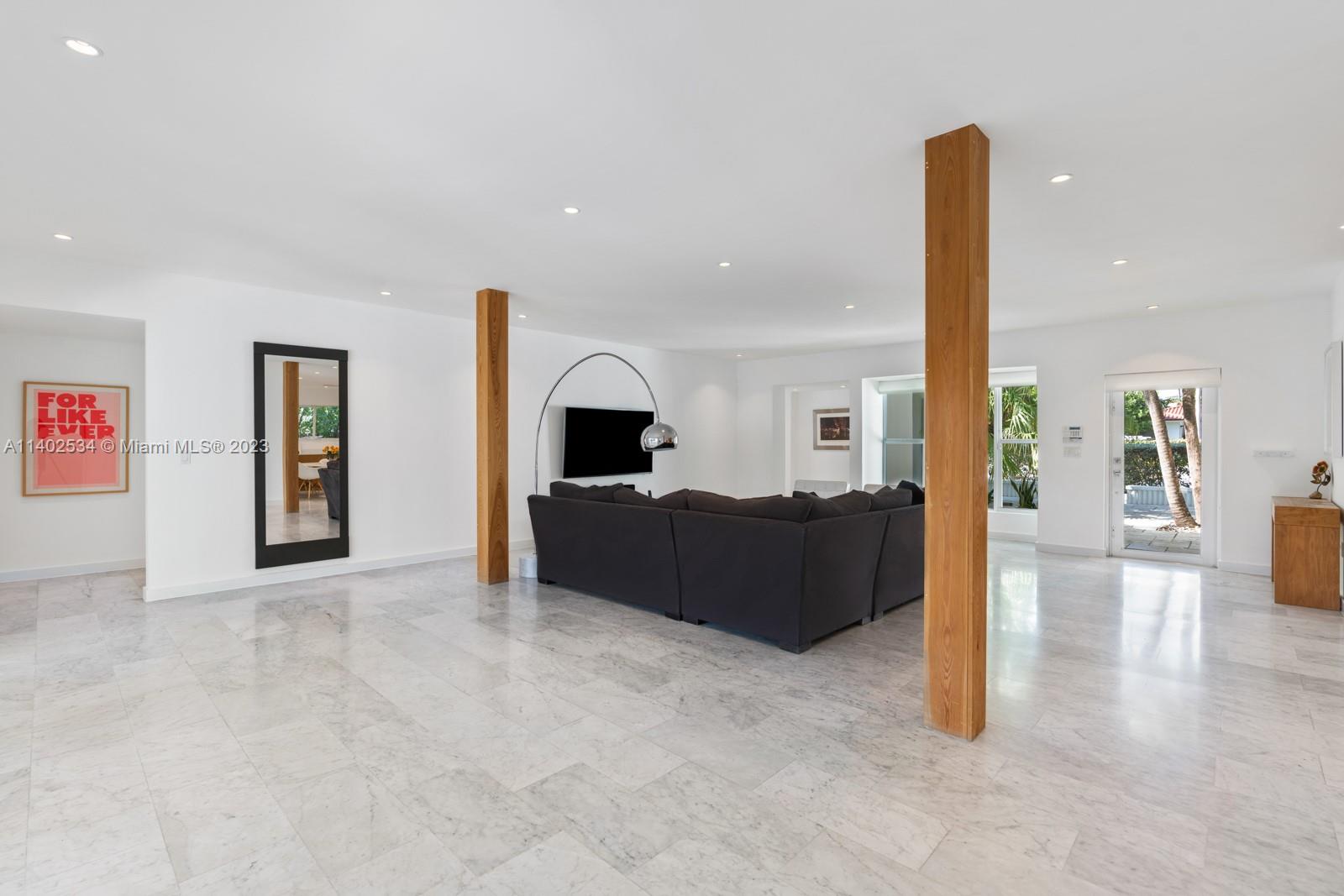 4741 Alton Road Miami Beach, FL 33140 - Photo 5 of 27 a living room with furniture
