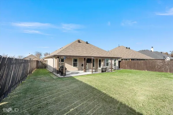 a house view with a garden space