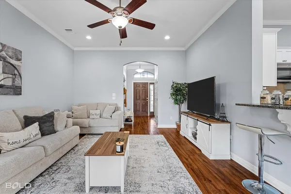 a living room with furniture and a couch