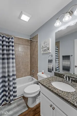 a bedroom with bed and a window