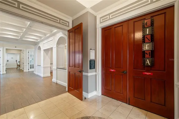 a view of a hallway with some storage and utility room