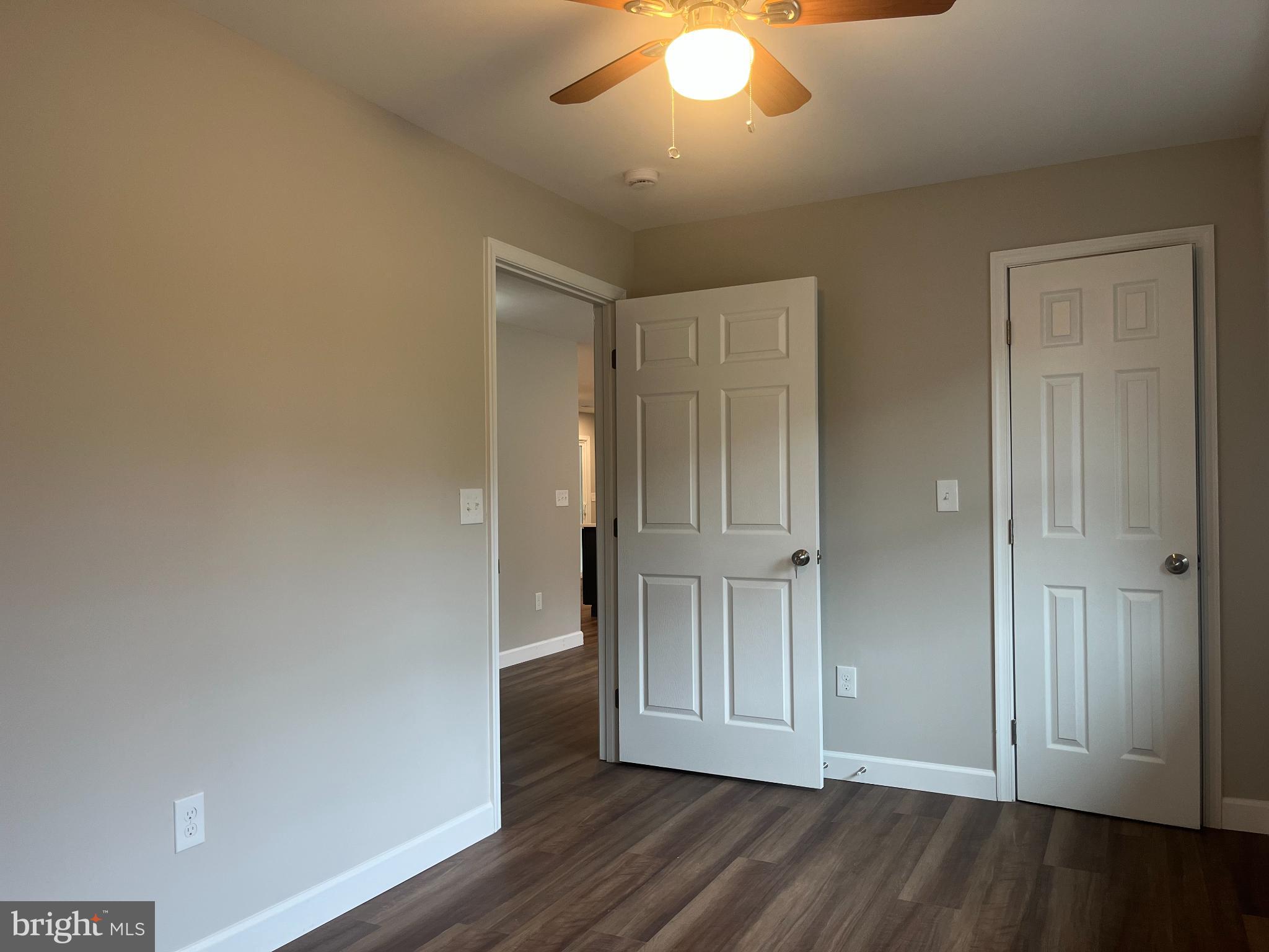 28542 Raccoon Ford Road Burr Hill, VA 22433 - Photo 24 of 31 wooden floor in an empty room
