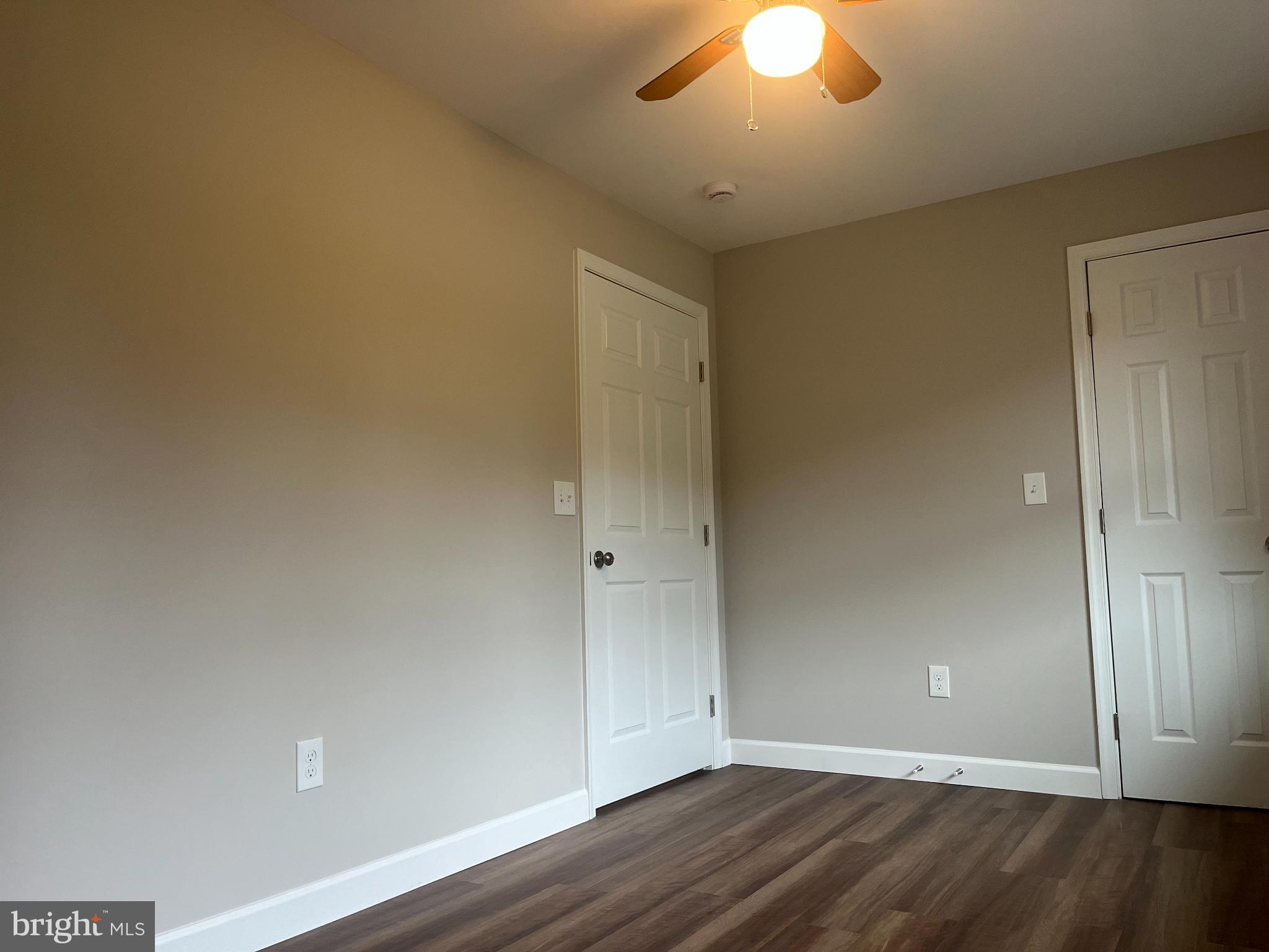 28542 Raccoon Ford Road Burr Hill, VA 22433 - Photo 25 of 31 wooden floor in an empty room