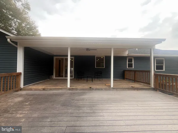 an entrance to house with yard