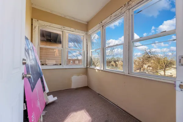 a view of a window in an empty room