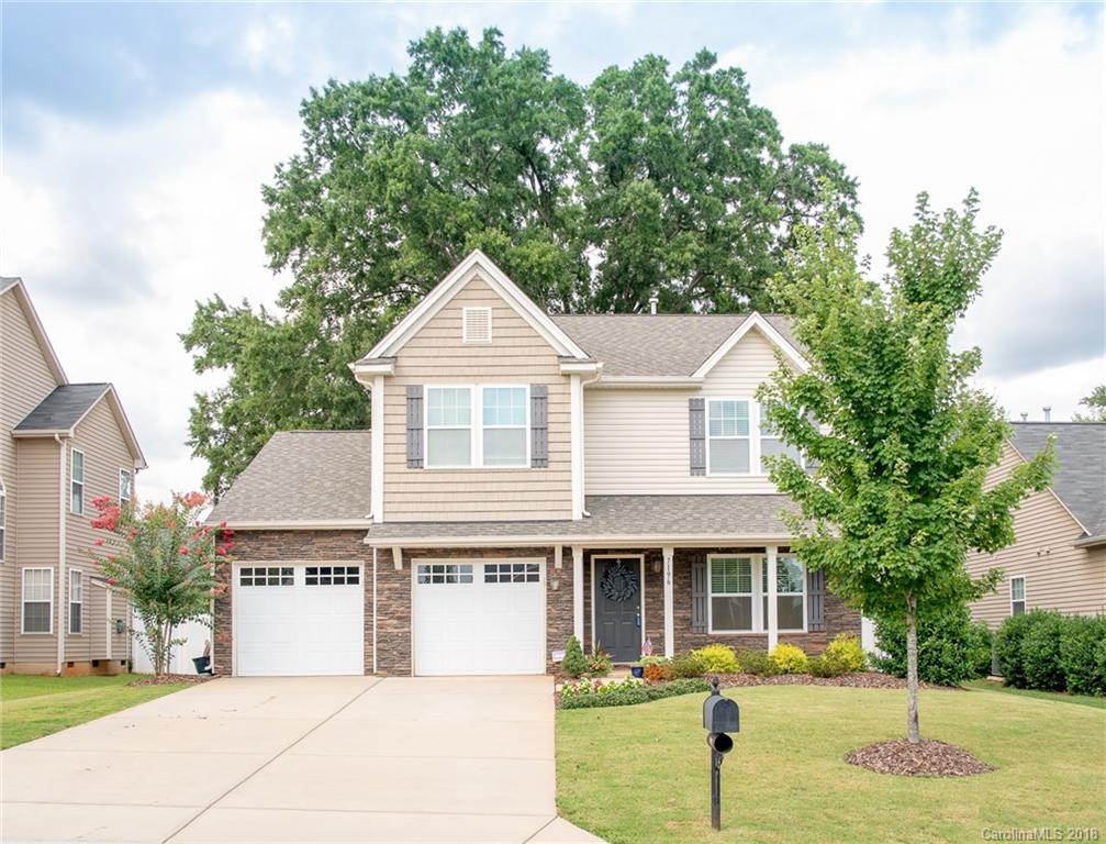 7196 Meyer Road Fort Mill, SC 29715 - Photo 1 of 31 a front view of a house with a yard