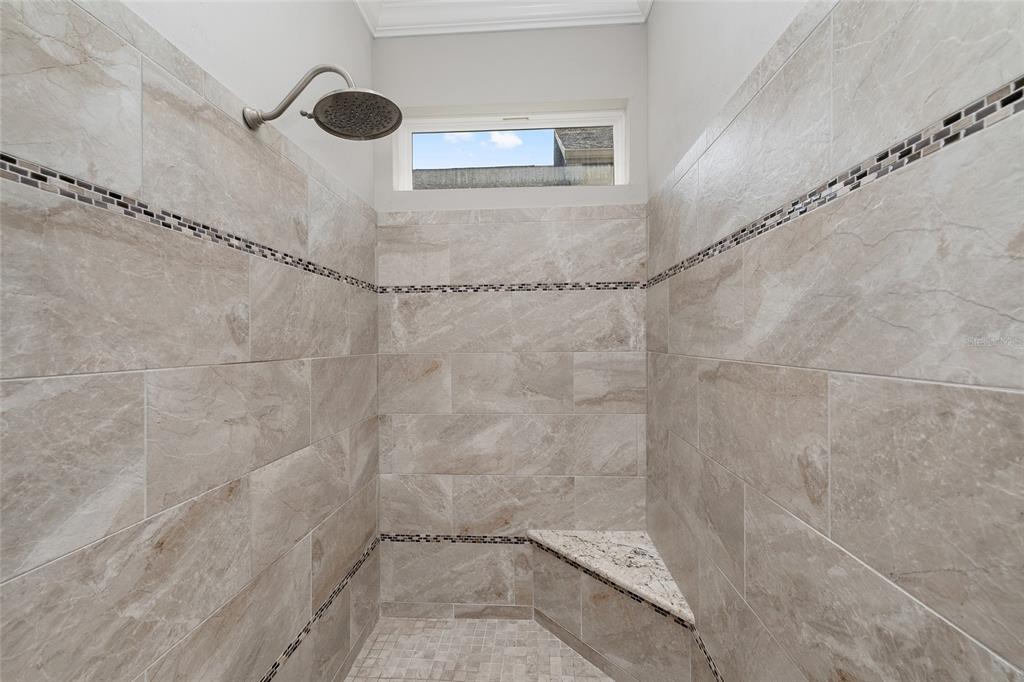 8942 Southwest 25 Road Gainesville, FL 32608 - Photo 11 of 22 a bathroom with a shower