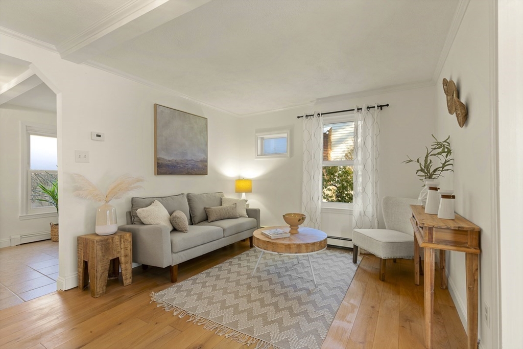 9 Summer Street Billerica, MA 01821 - Photo 11 of 40 a living room with furniture and a window