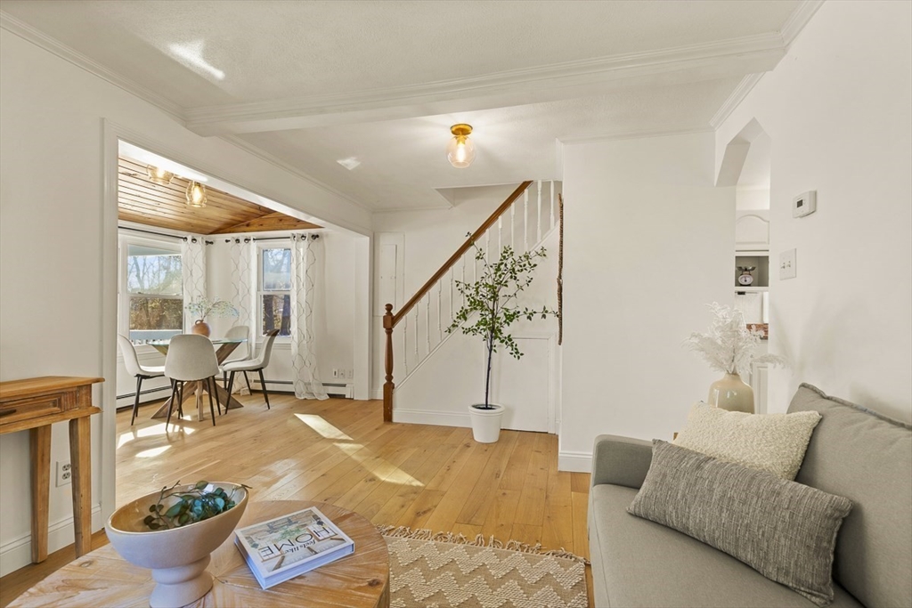 9 Summer Street Billerica, MA 01821 - Photo 13 of 40 a living room with furniture and a large window