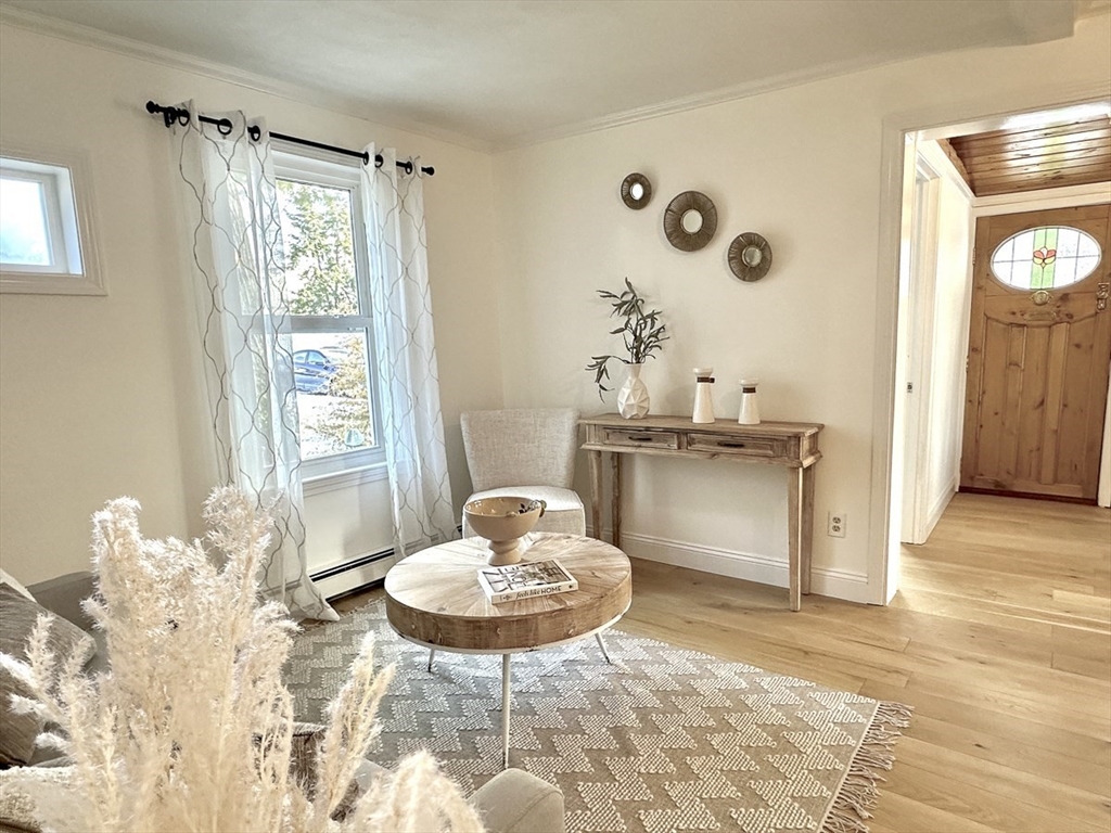 9 Summer Street Billerica, MA 01821 - Photo 14 of 40 a living room with furniture