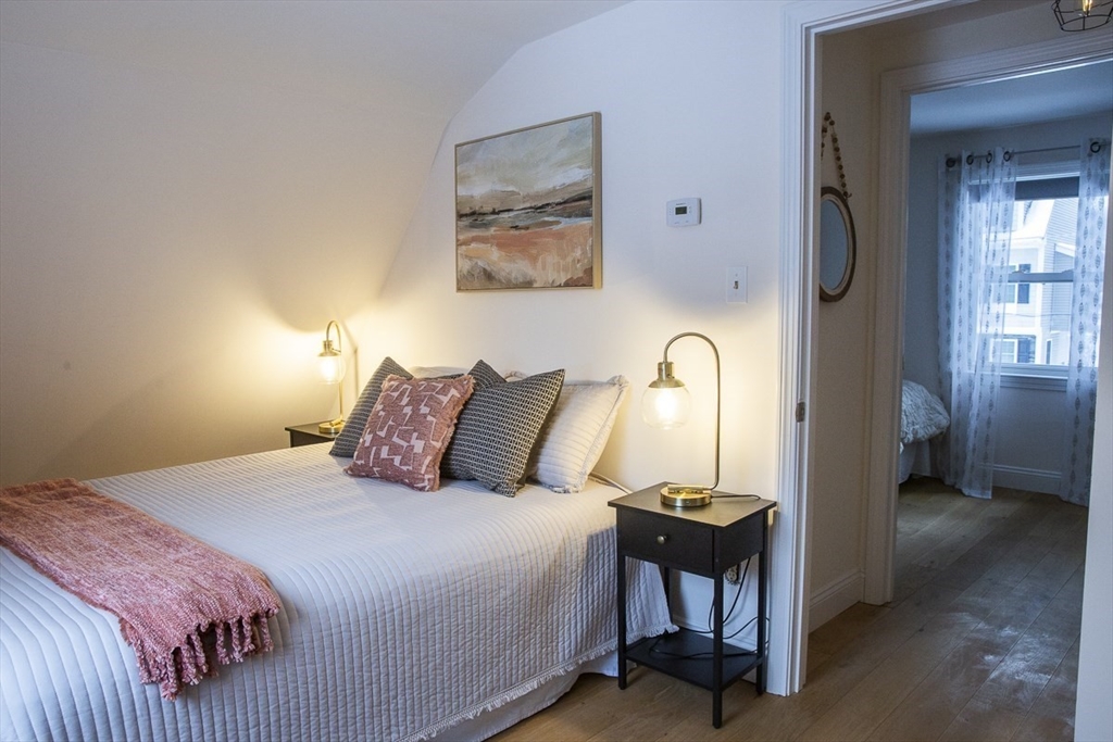 9 Summer Street Billerica, MA 01821 - Photo 30 of 40 a bedroom with a bed and a mirror