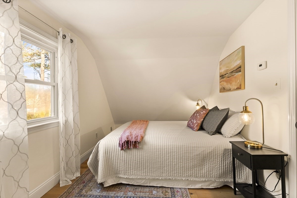 9 Summer Street Billerica, MA 01821 - Photo 31 of 40 a bedroom with a bed and a window