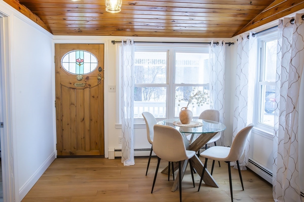 9 Summer Street Billerica, MA 01821 - Photo 8 of 40 a view of a dining room with furniture window and wooden floor