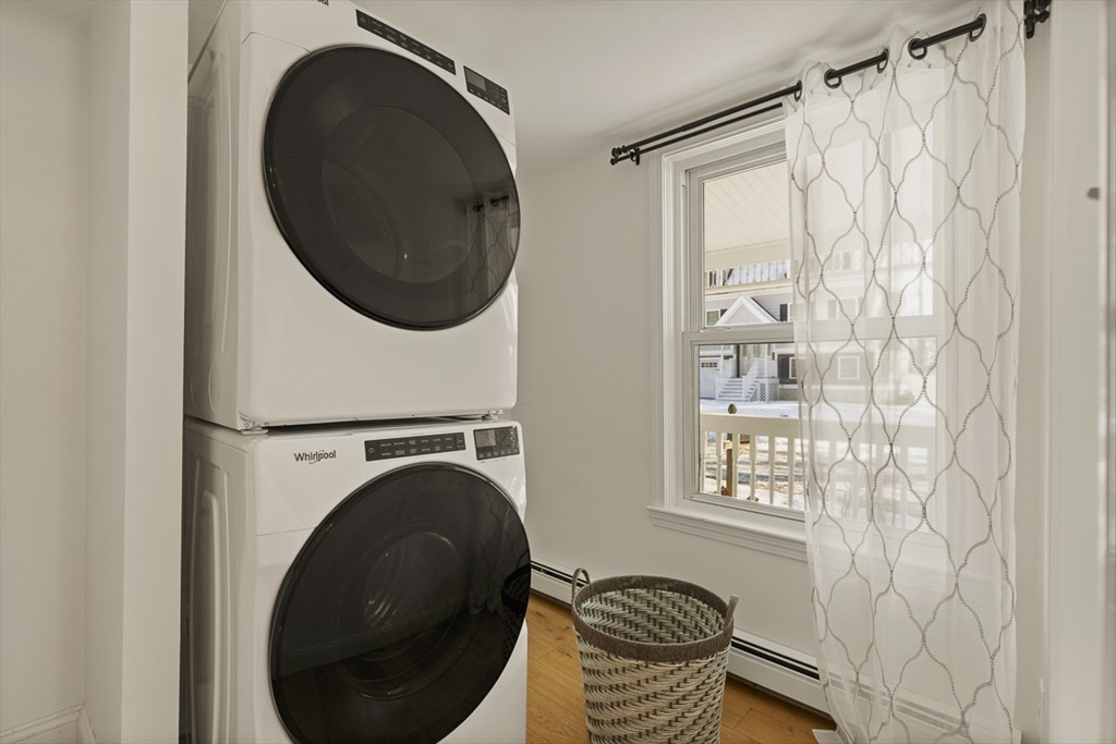 9 Summer Street Billerica, MA 01821 - Photo 10 of 40 a view of a bedroom with washer and dryer