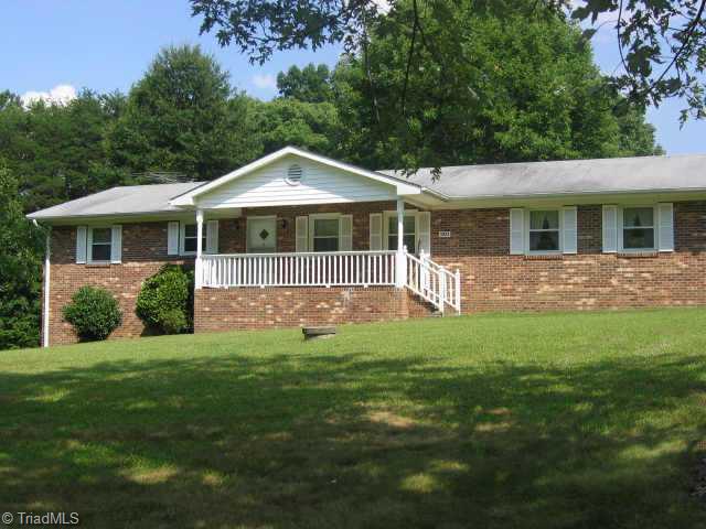 5922 Pepper Road Oak Ridge, NC 27310 - Photo 1 of 9 Exterior Front.