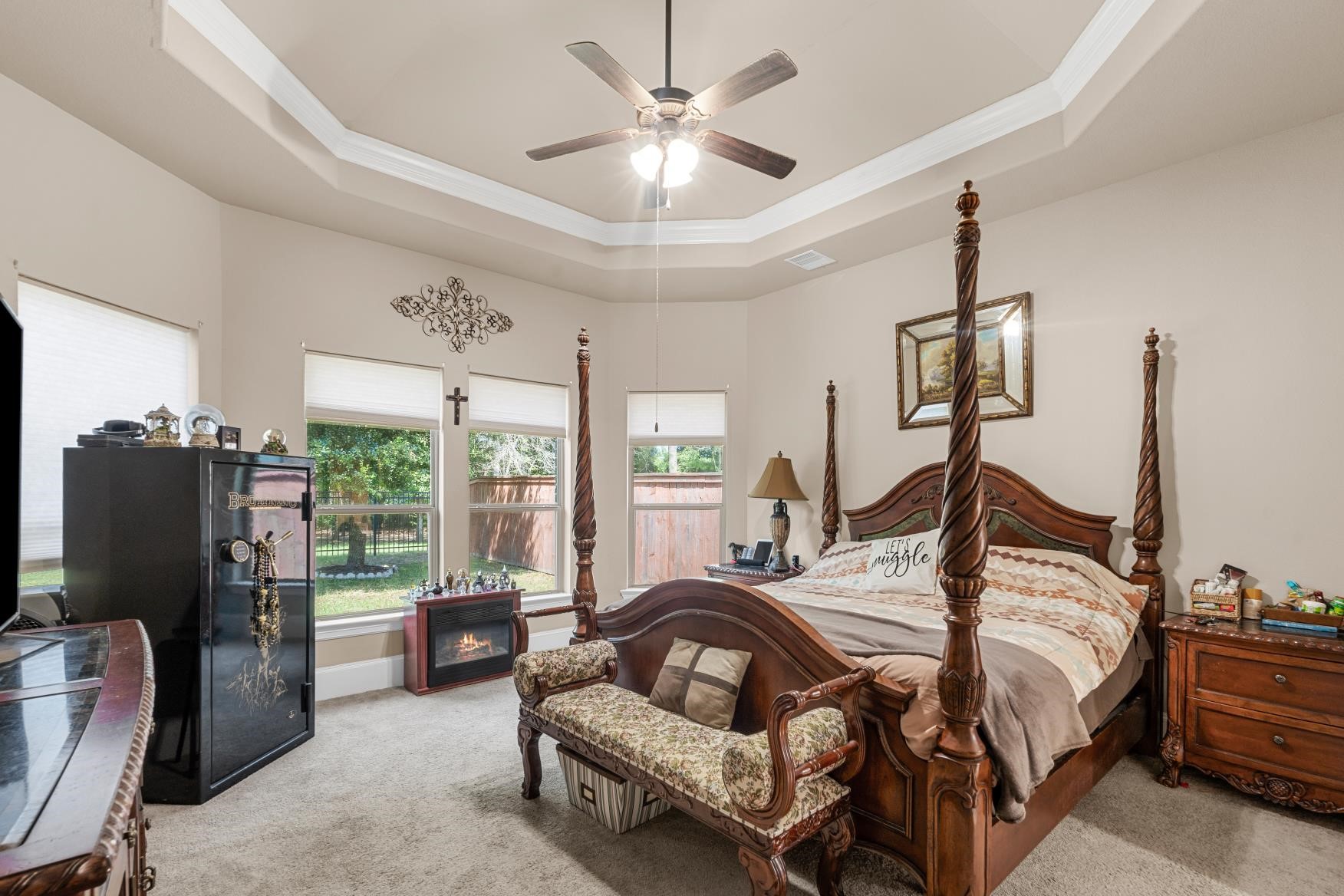 25210 Quiet Ledge Porter, TX 77365 - Photo 8 of 16 a bedroom with bed or couch and a flat tv screen