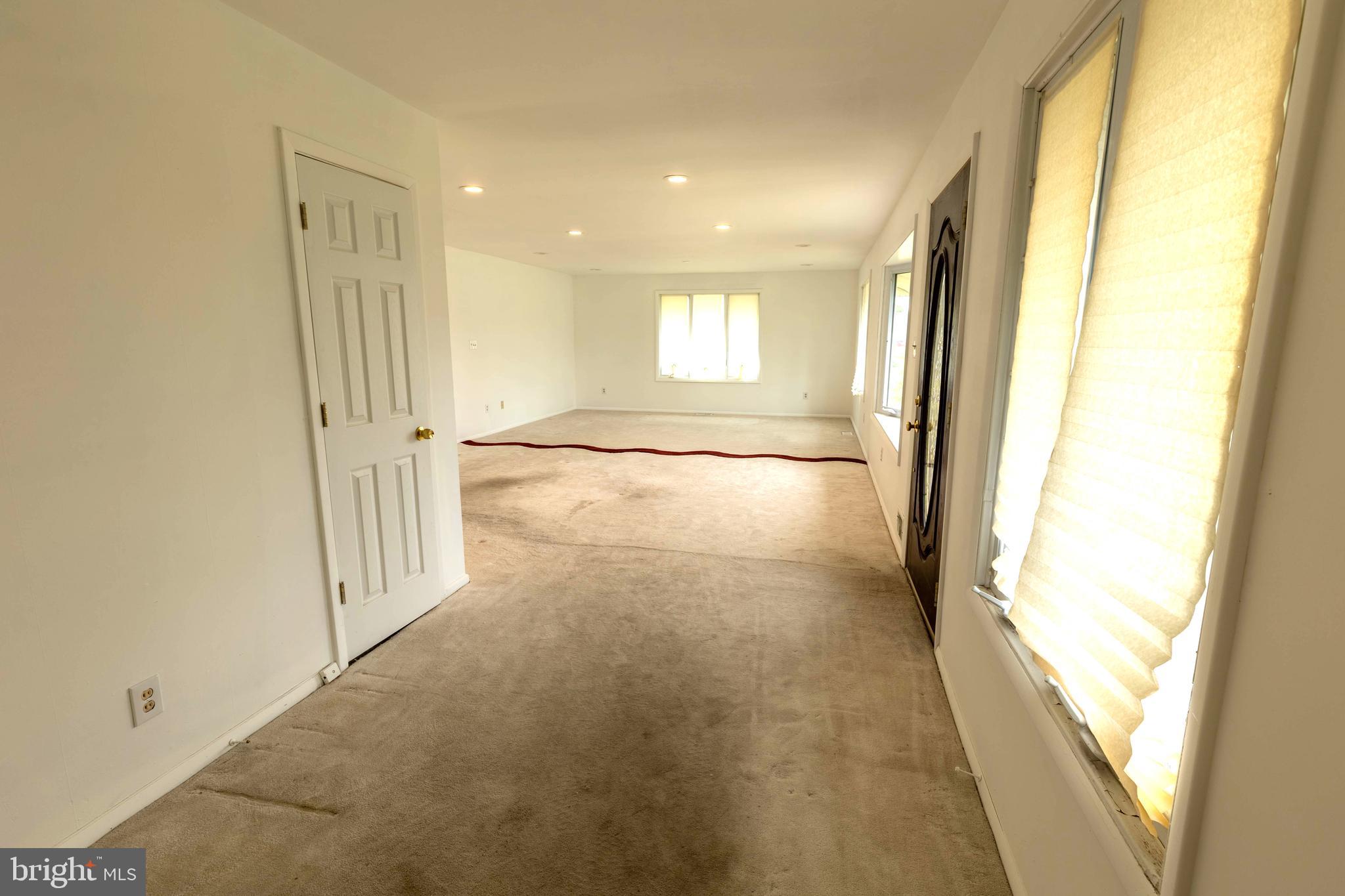7 Lansdowne Road Burlington, NJ 08016 - Photo 4 of 8 a view of entryway with wooden floor