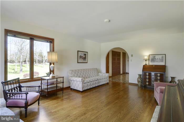 14900 Mount Nebo Road Poolesville, MD 20837 - Photo 11 of 30 a living room with furniture and a large window