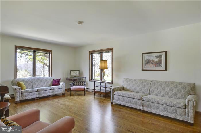 14900 Mount Nebo Road Poolesville, MD 20837 - Photo 12 of 30 a living room with furniture and a window