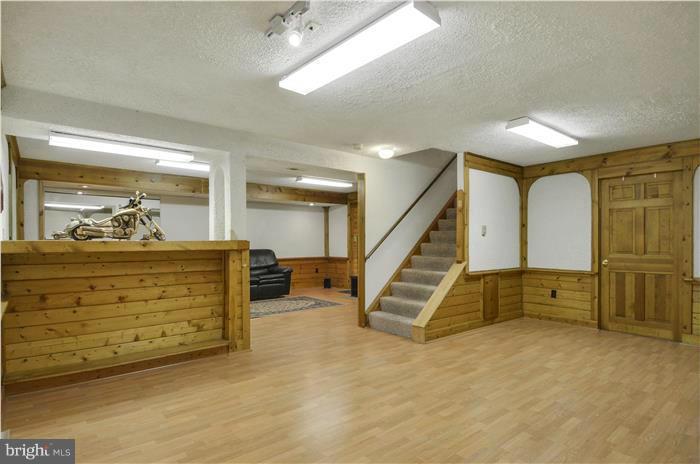 14900 Mount Nebo Road Poolesville, MD 20837 - Photo 18 of 30 a view of room with stairs and furniture