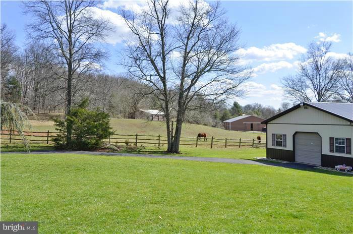 14900 Mount Nebo Road Poolesville, MD 20837 - Photo 29 of 30 a view of a house with a big yard and large tree