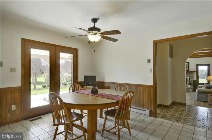 14900 Mount Nebo Road Poolesville, MD 20837 - Photo 4 of 30 a view of a dining room with furniture and window