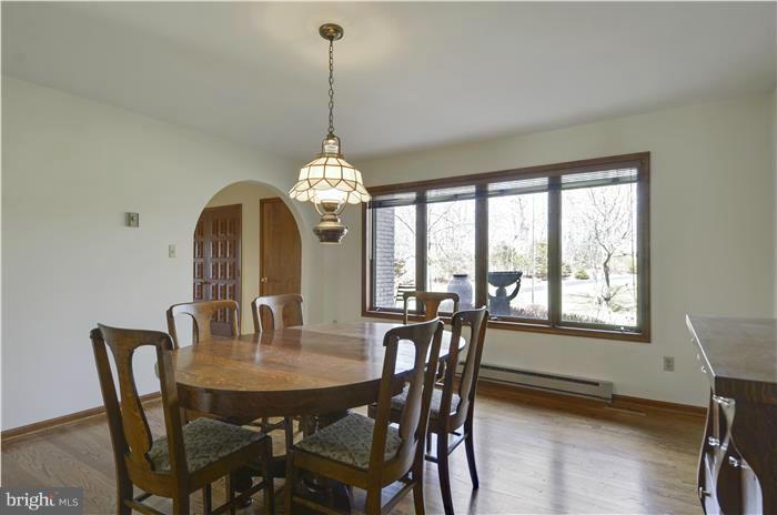 14900 Mount Nebo Road Poolesville, MD 20837 - Photo 9 of 30 a view of a dining room with furniture window and outside view
