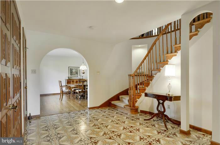 14900 Mount Nebo Road Poolesville, MD 20837 - Photo 10 of 30 a view of entryway dining room and hall with wooden floor