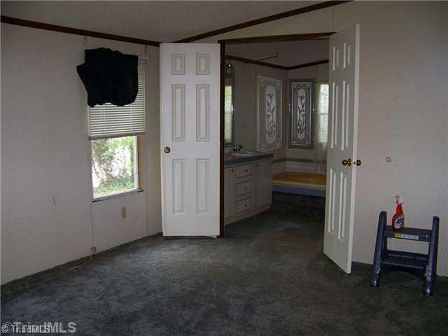 184 Glass Road Mount Airy, NC 27030 - Photo 6 of 13 Master Bedroom.