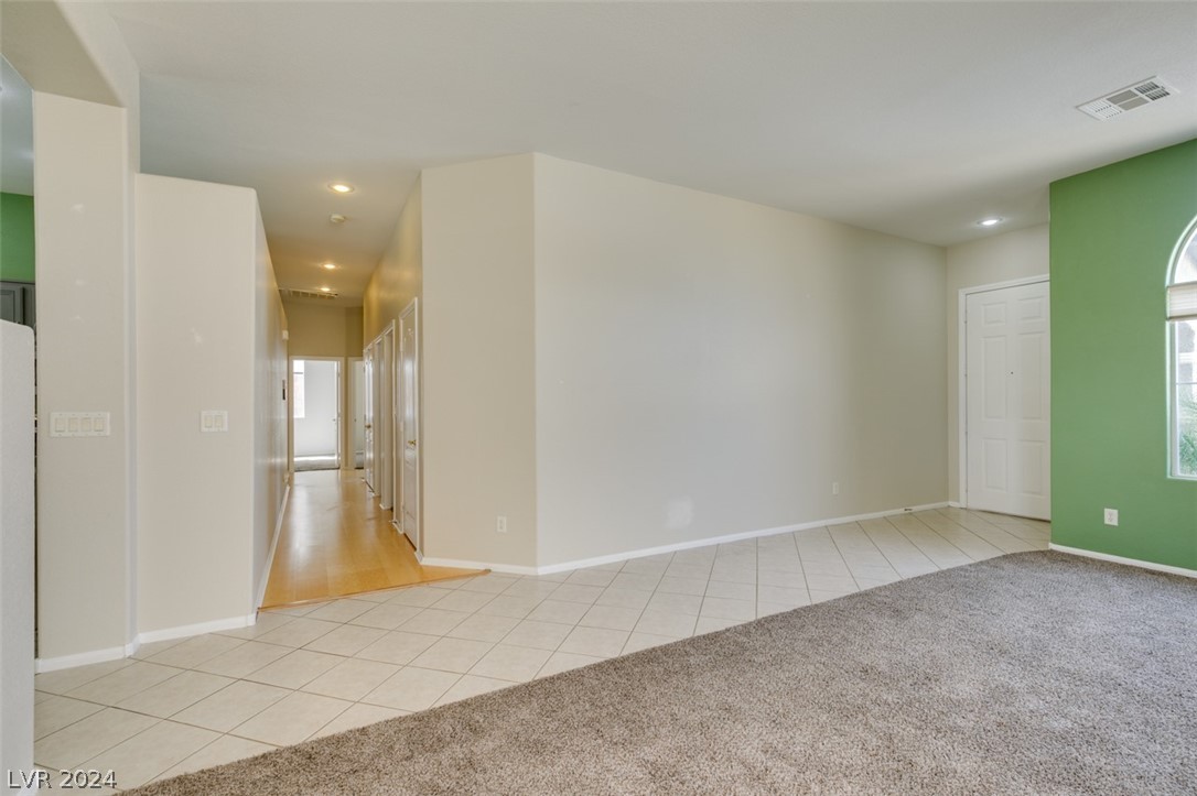 191 Ruby Ridge Avenue Henderson, NV 89002 - Photo 8 of 38 Living room looking towards hallway leading to bed